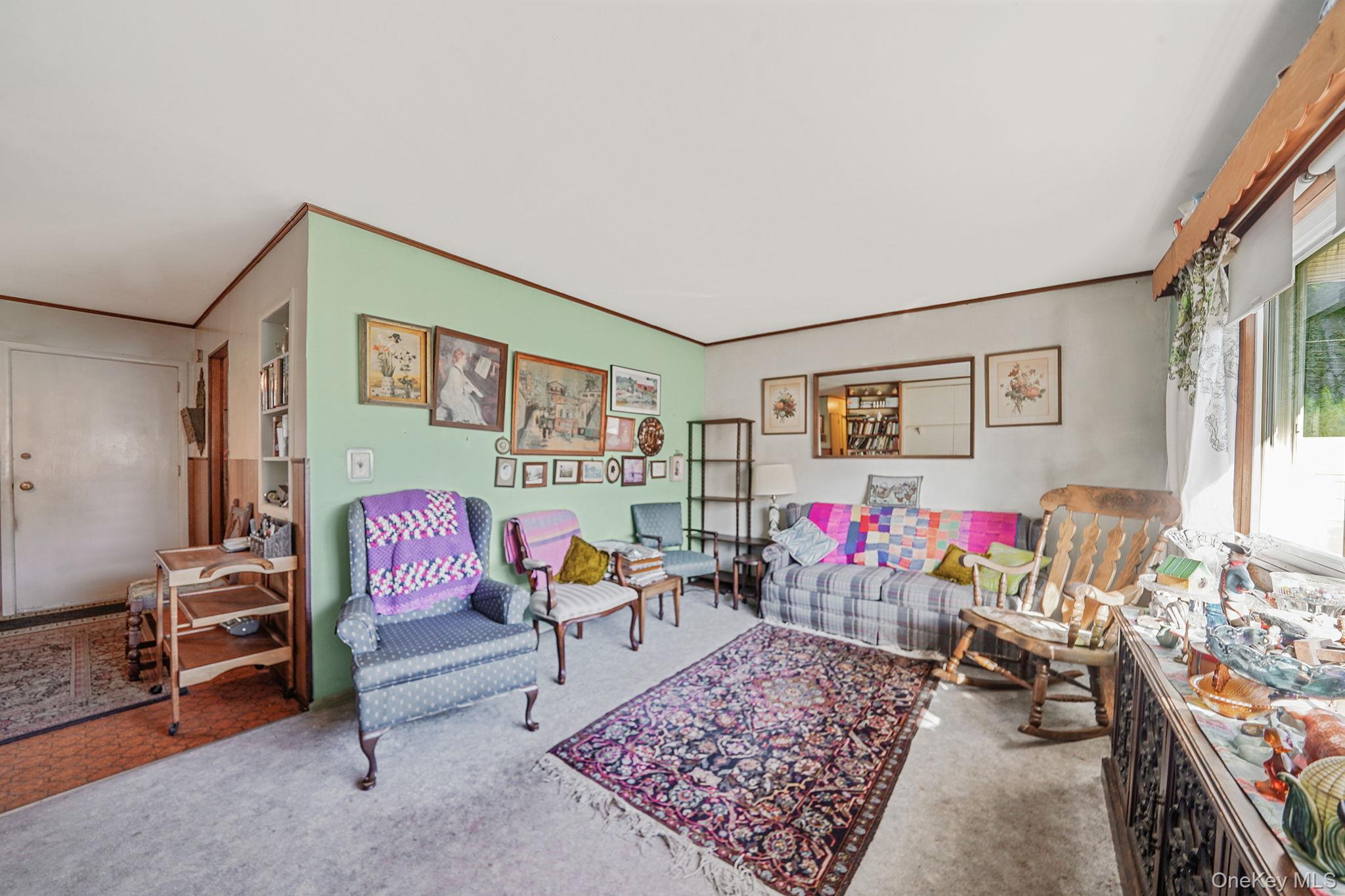 2 Sydney Street Plainview, NY 11803 - Photo 12 of 26 a living room with furniture and a couch
