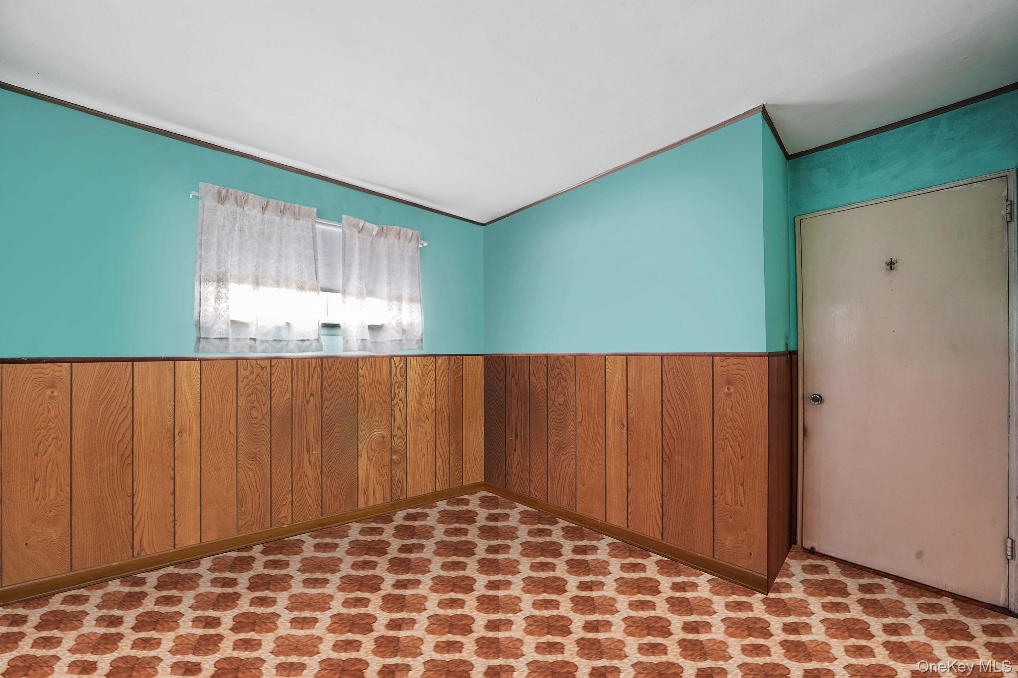 2 Sydney Street Plainview, NY 11803 - Photo 16 of 26 a view of an empty room and window