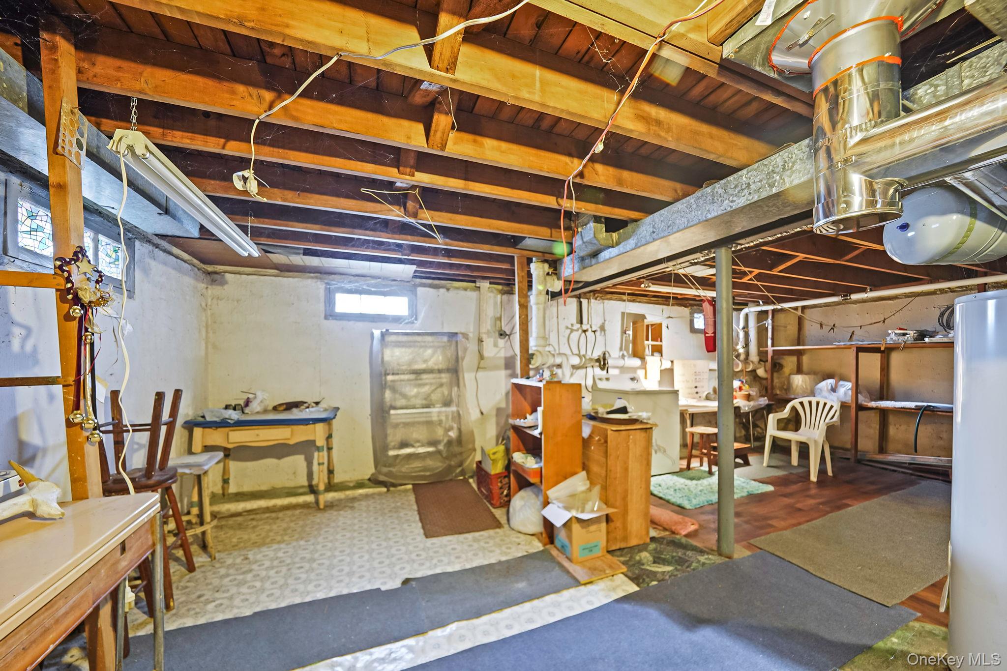 2 Sydney Street Plainview, NY 11803 - Photo 22 of 26 a view of a storage room with chairs