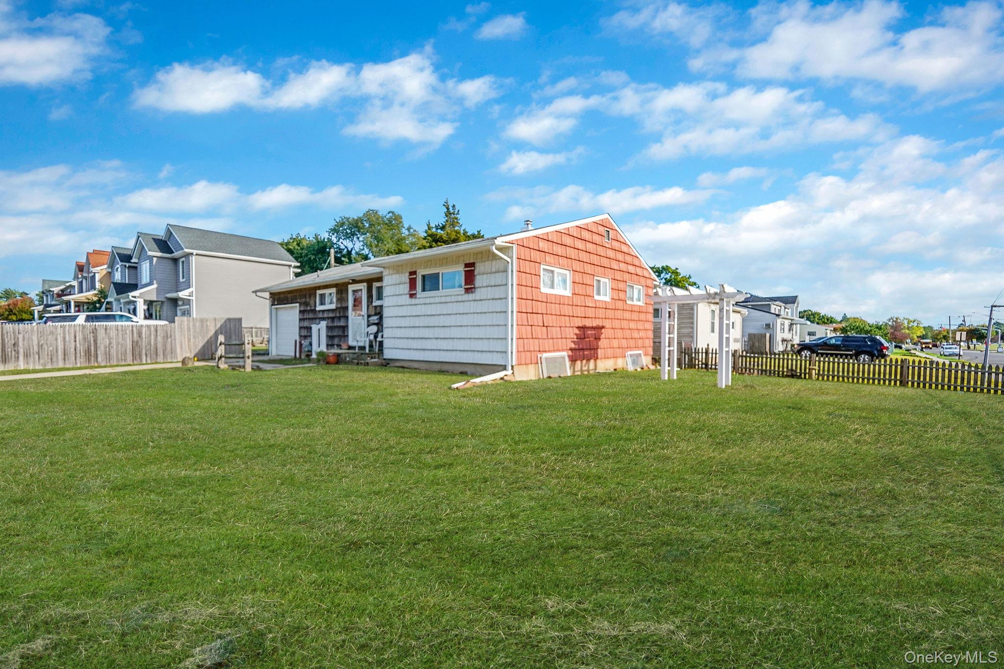2 Sydney Street Plainview, NY 11803 - Photo 4 of 26 a view of a house with a backyard