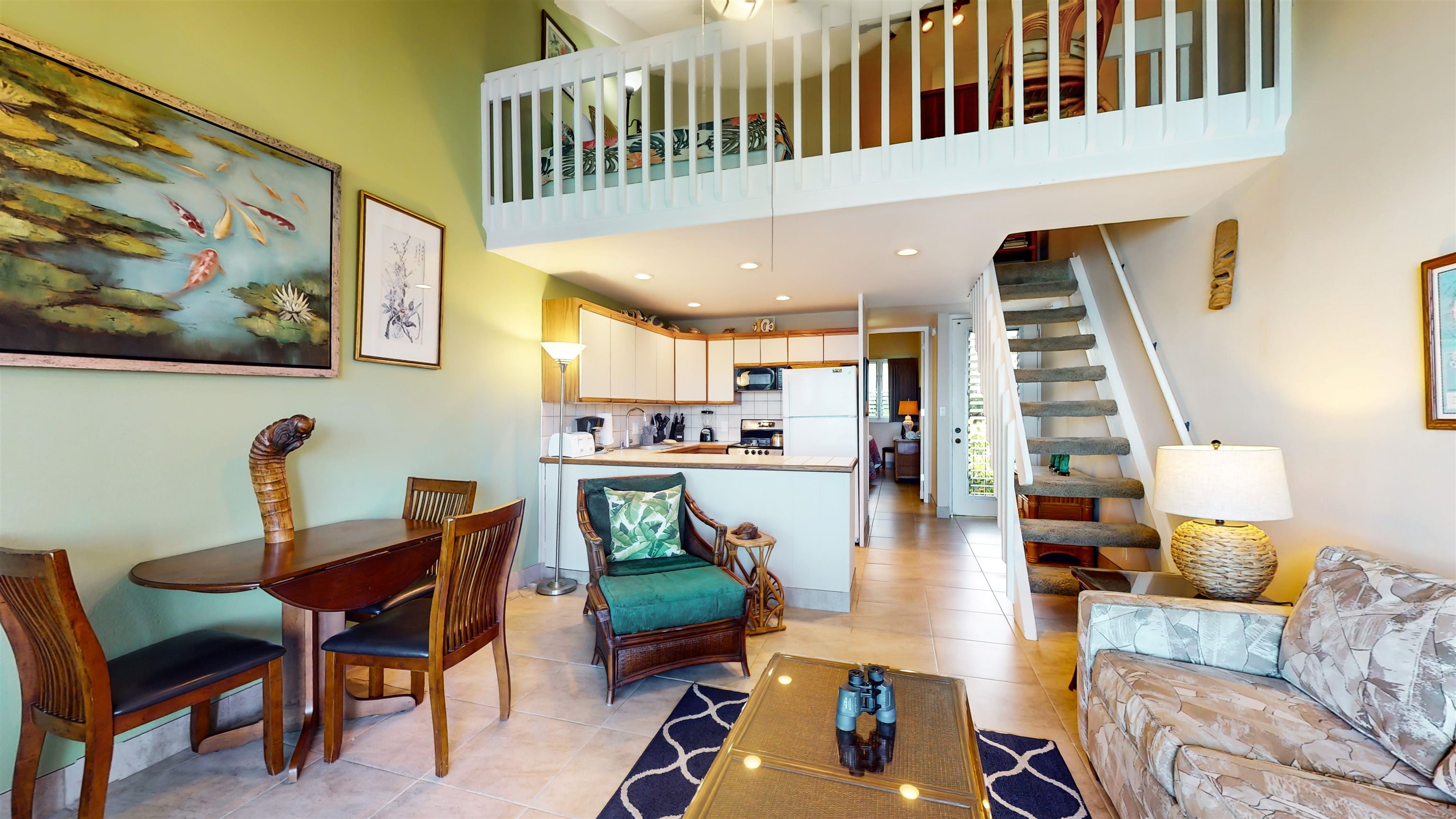 5255 Lower Honoapiilani Road, Unit 219 Lahaina, HI 96761 - Photo 7 of 12 a living room with furniture and wooden floor