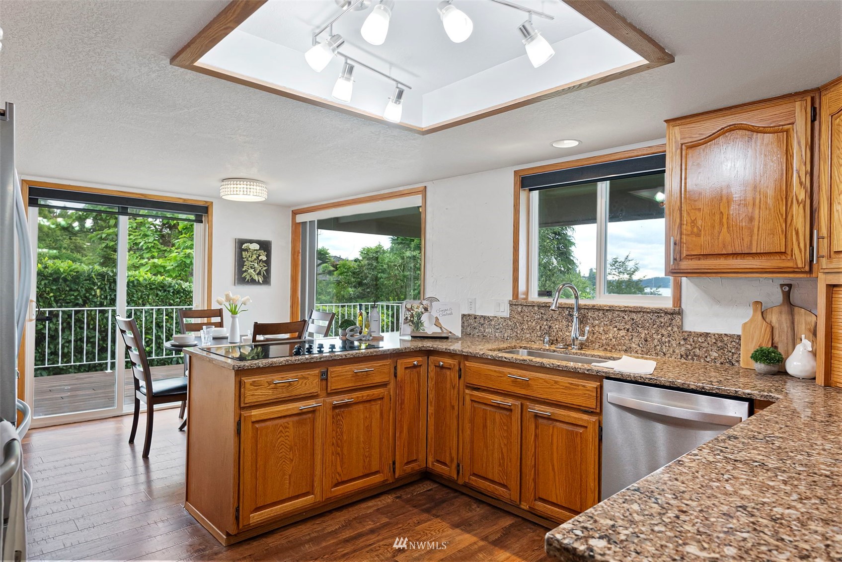 3891 Rama Drive East Port Orchard, WA 98366 - Photo 11 of 32 a kitchen with lots of counter top space and windows
