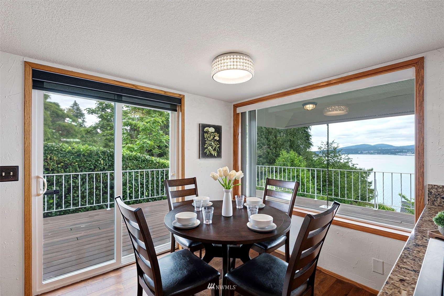 3891 Rama Drive East Port Orchard, WA 98366 - Photo 12 of 32 a view of a dining room with furniture window and outside view