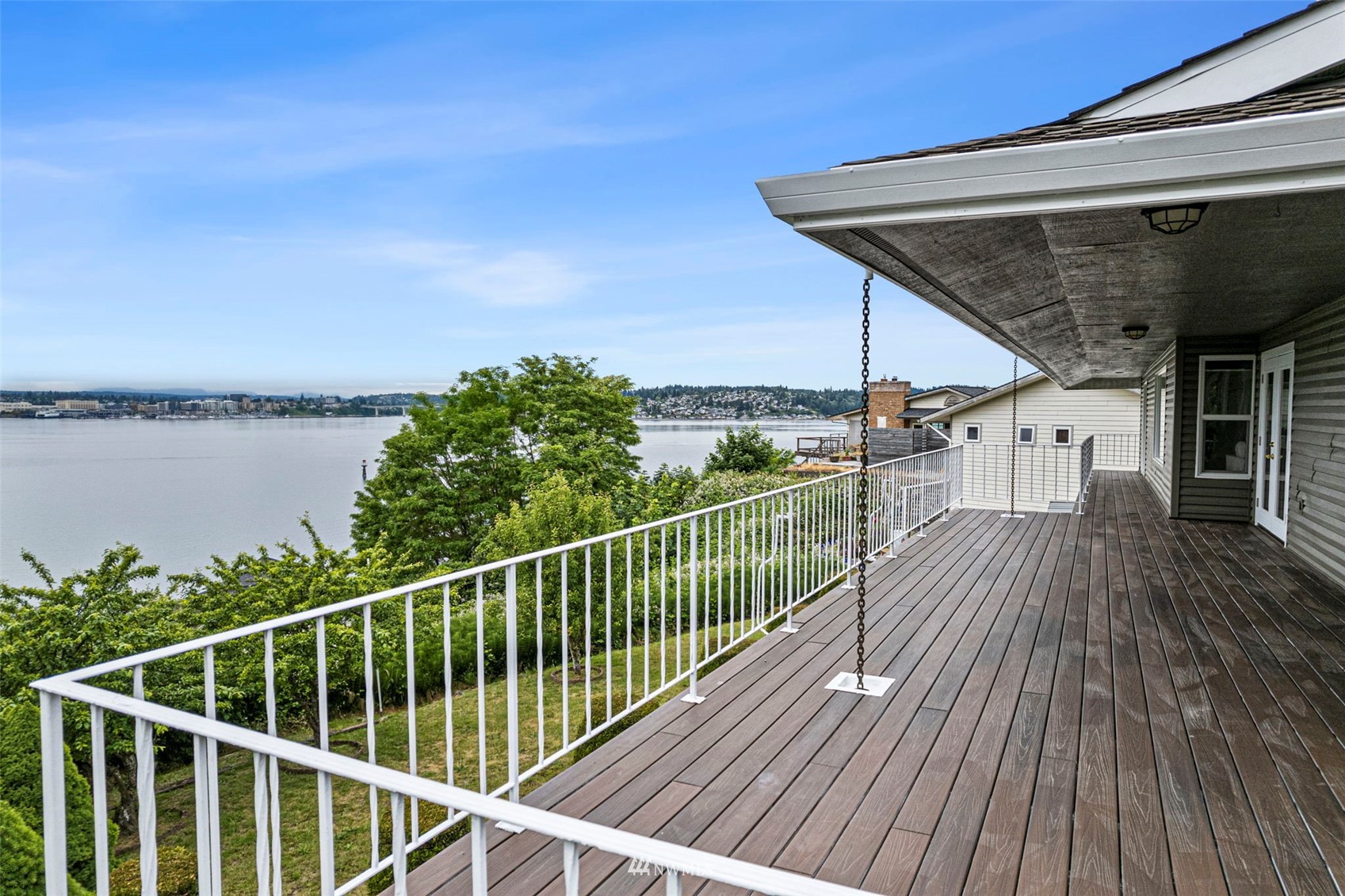 3891 Rama Drive East Port Orchard, WA 98366 - Photo 14 of 32 a view of balcony with deck and wooden floor