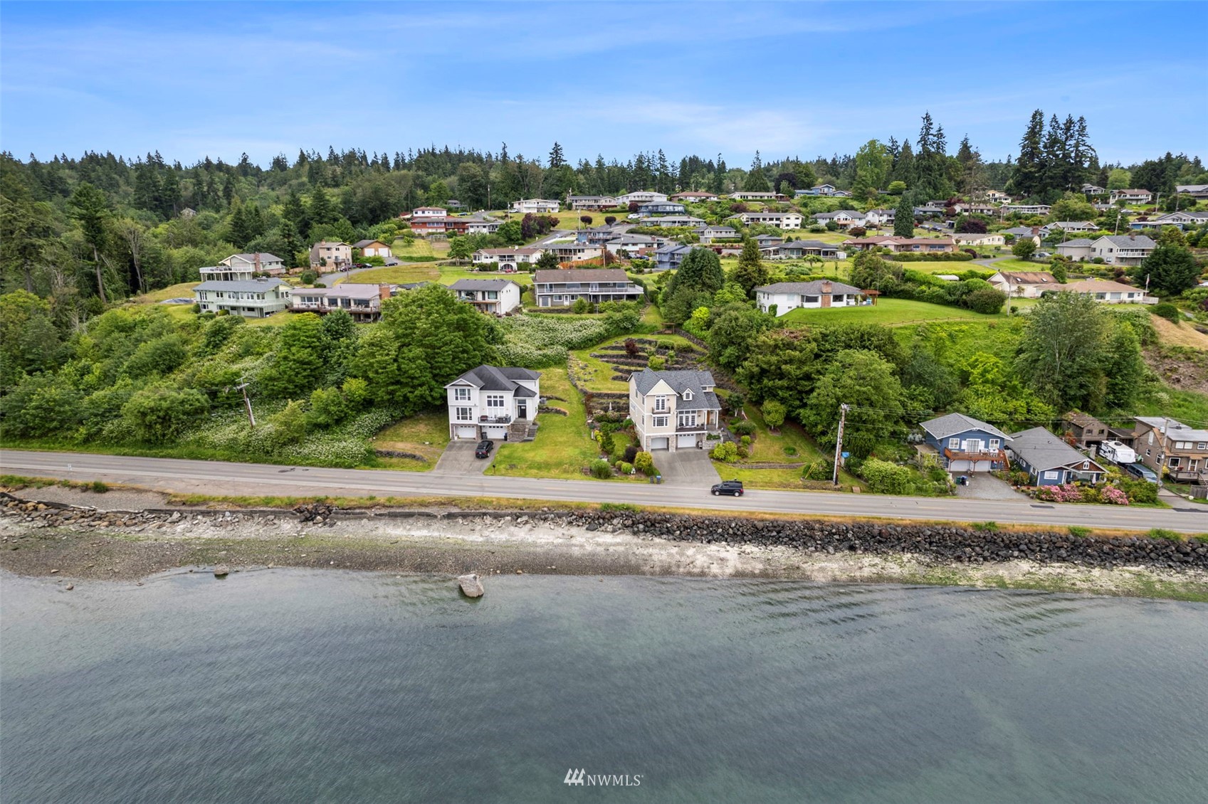 3891 Rama Drive East Port Orchard, WA 98366 - Photo 2 of 32 a view of a street with a houses
