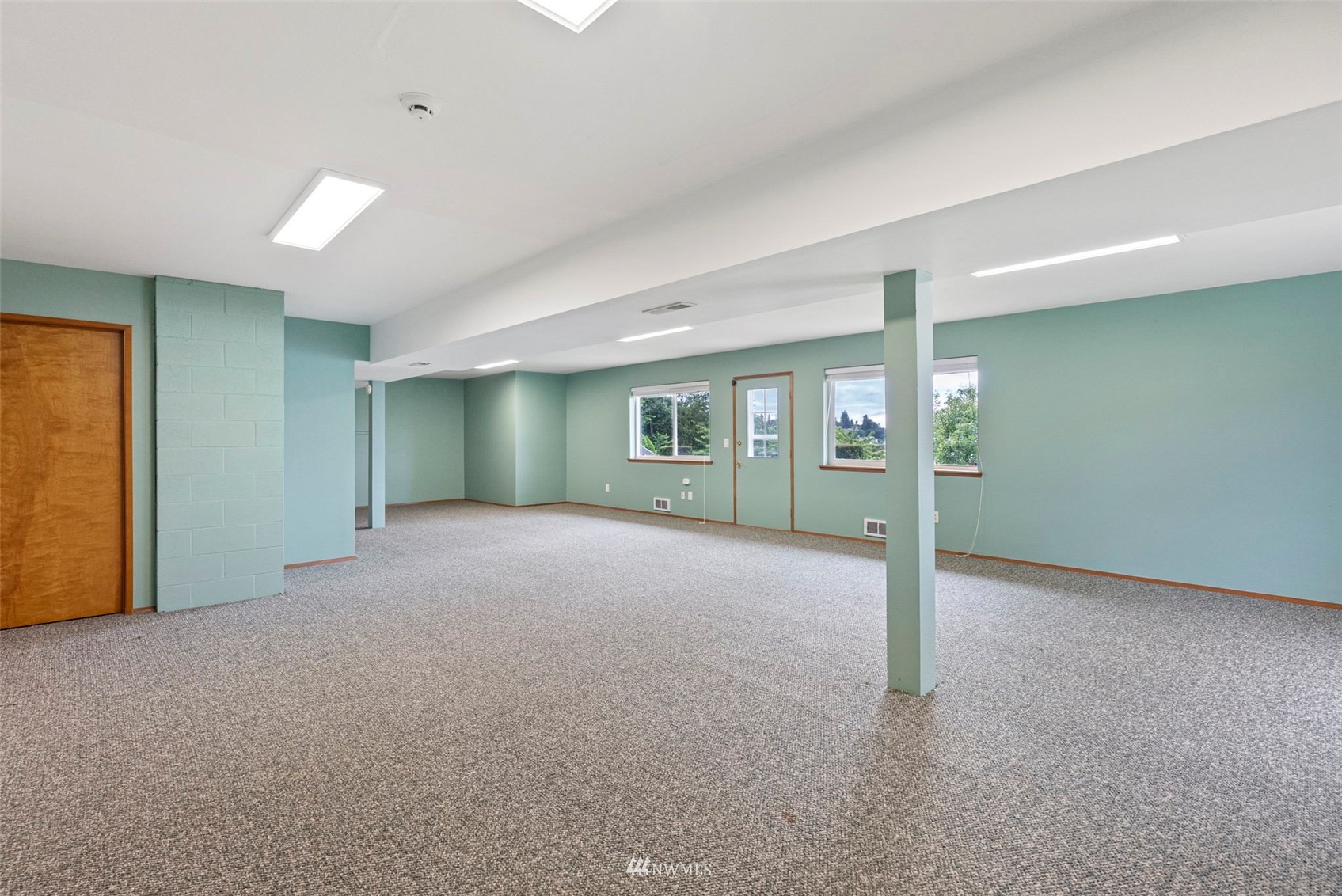 3891 Rama Drive East Port Orchard, WA 98366 - Photo 25 of 32 an empty room with entrance and windows