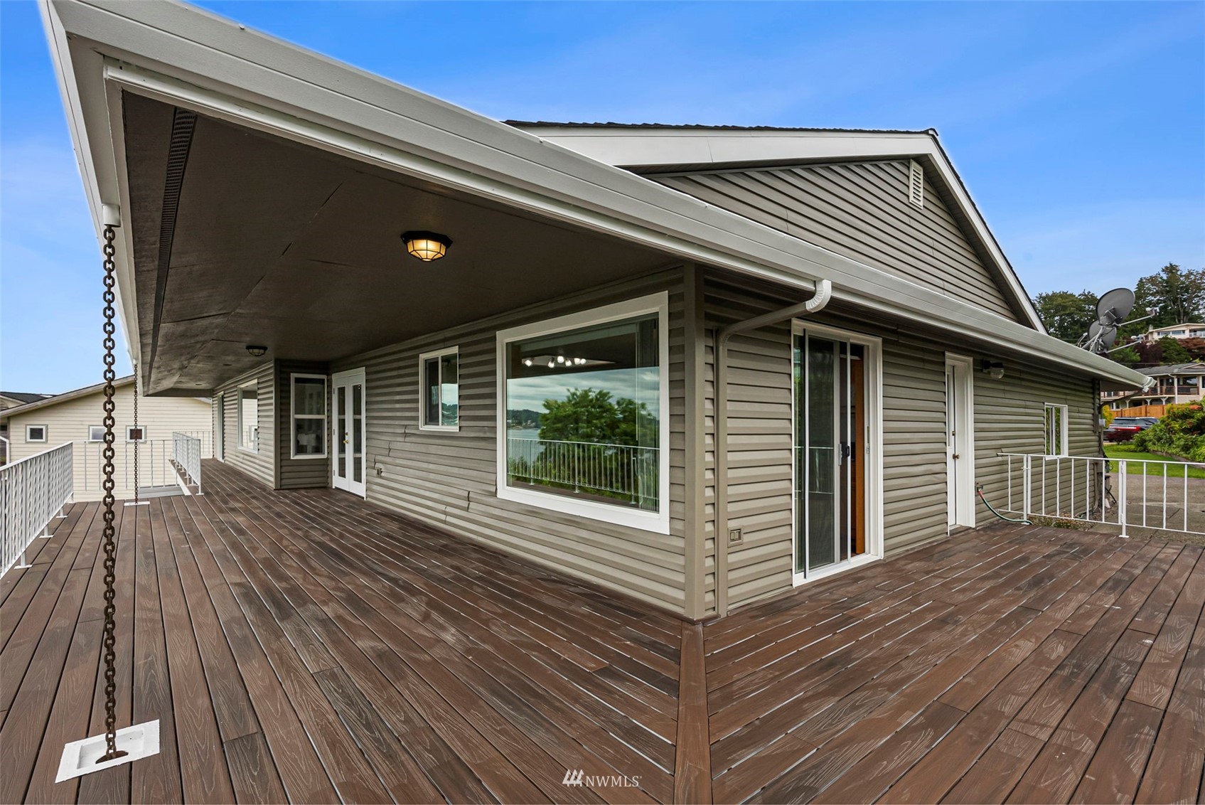 3891 Rama Drive East Port Orchard, WA 98366 - Photo 28 of 32 a front view of a house with garden