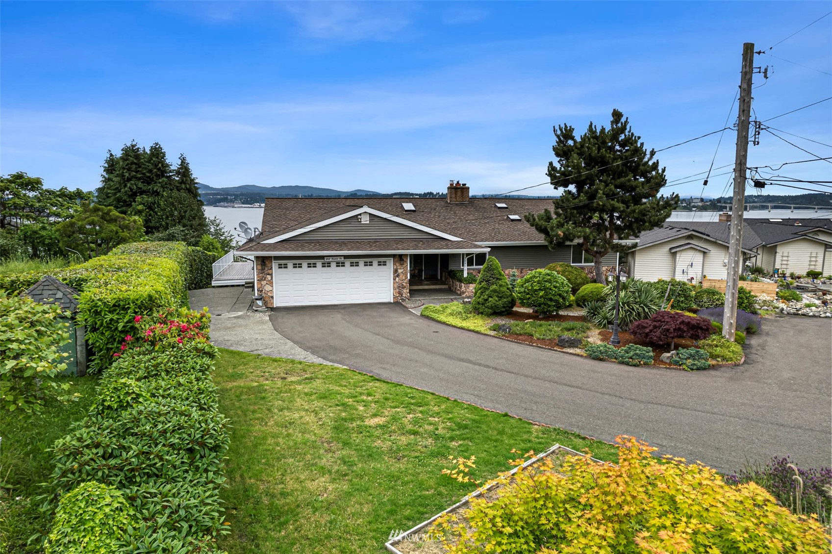 3891 Rama Drive East Port Orchard, WA 98366 - Photo 3 of 32 front view of a house with a yard