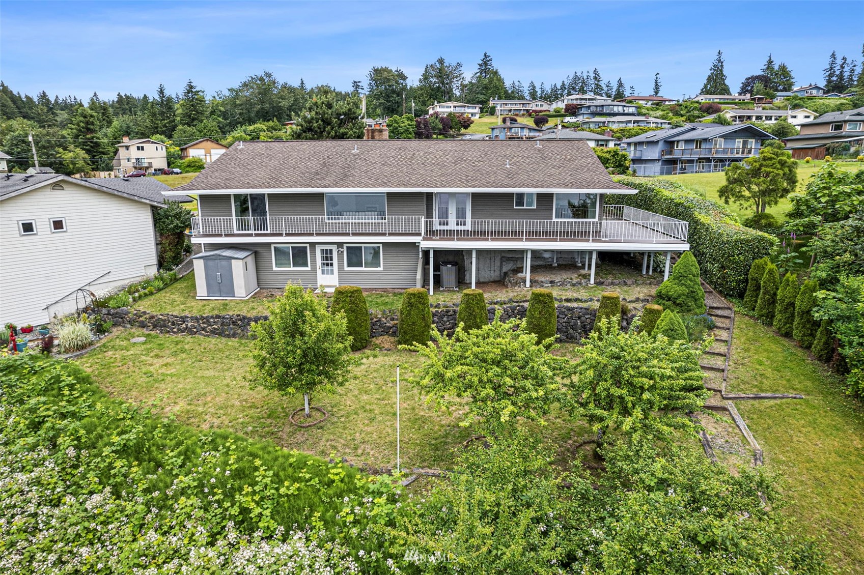 3891 Rama Drive East Port Orchard, WA 98366 - Photo 4 of 32 an aerial view of residential houses with outdoor space and trees