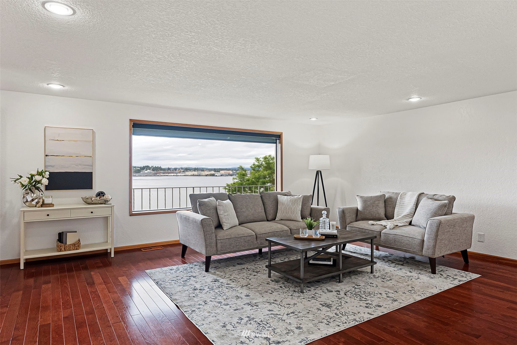 3891 Rama Drive East Port Orchard, WA 98366 - Photo 7 of 32 a living room with furniture and a wooden floor