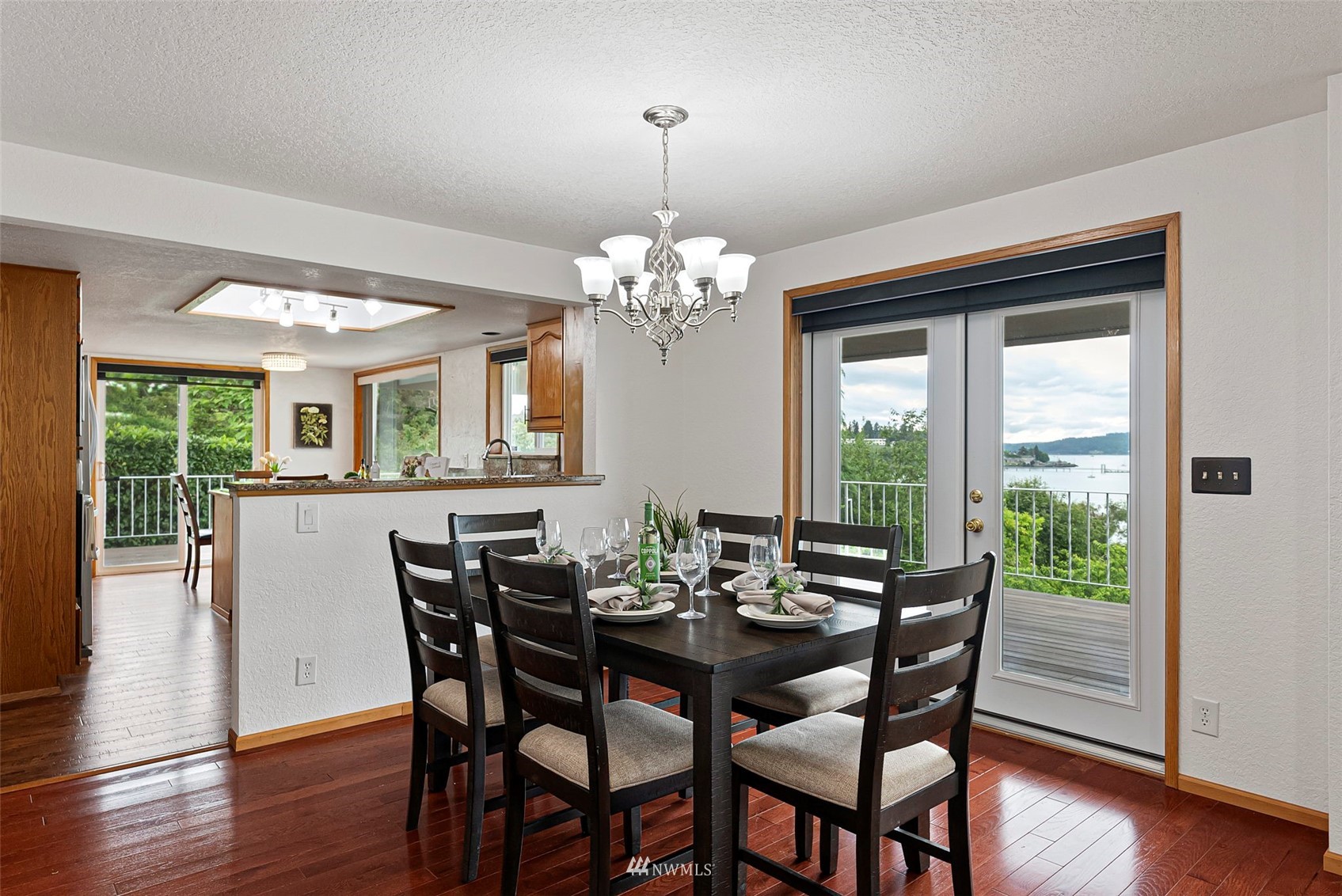 3891 Rama Drive East Port Orchard, WA 98366 - Photo 9 of 32 a view of a dining room with furniture window and outside view