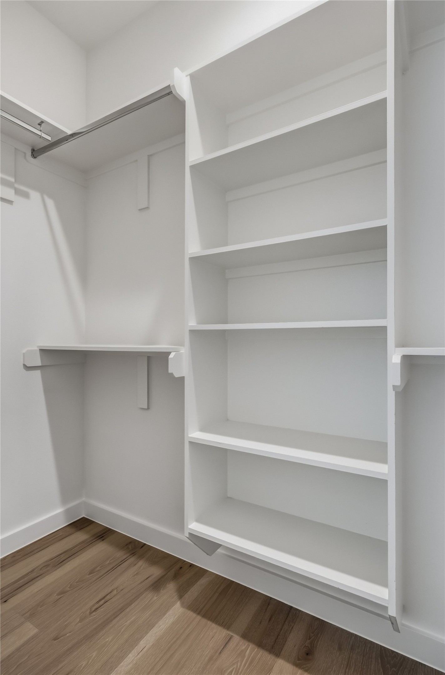 6809 Porter Street, Unit 1 Austin, TX 78741 - Photo 27 of 40 Functional custom closet system with hanging space and ample shelving ensures organization.
