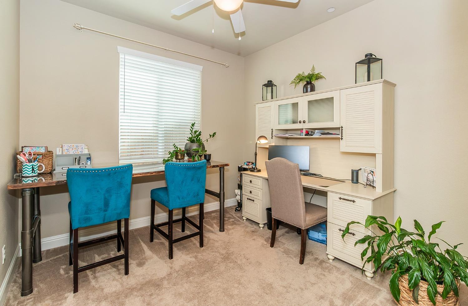 2716 Pontiac Avenue Clovis, CA 93611 - Photo 25 of 32 a workspace with furniture and a window