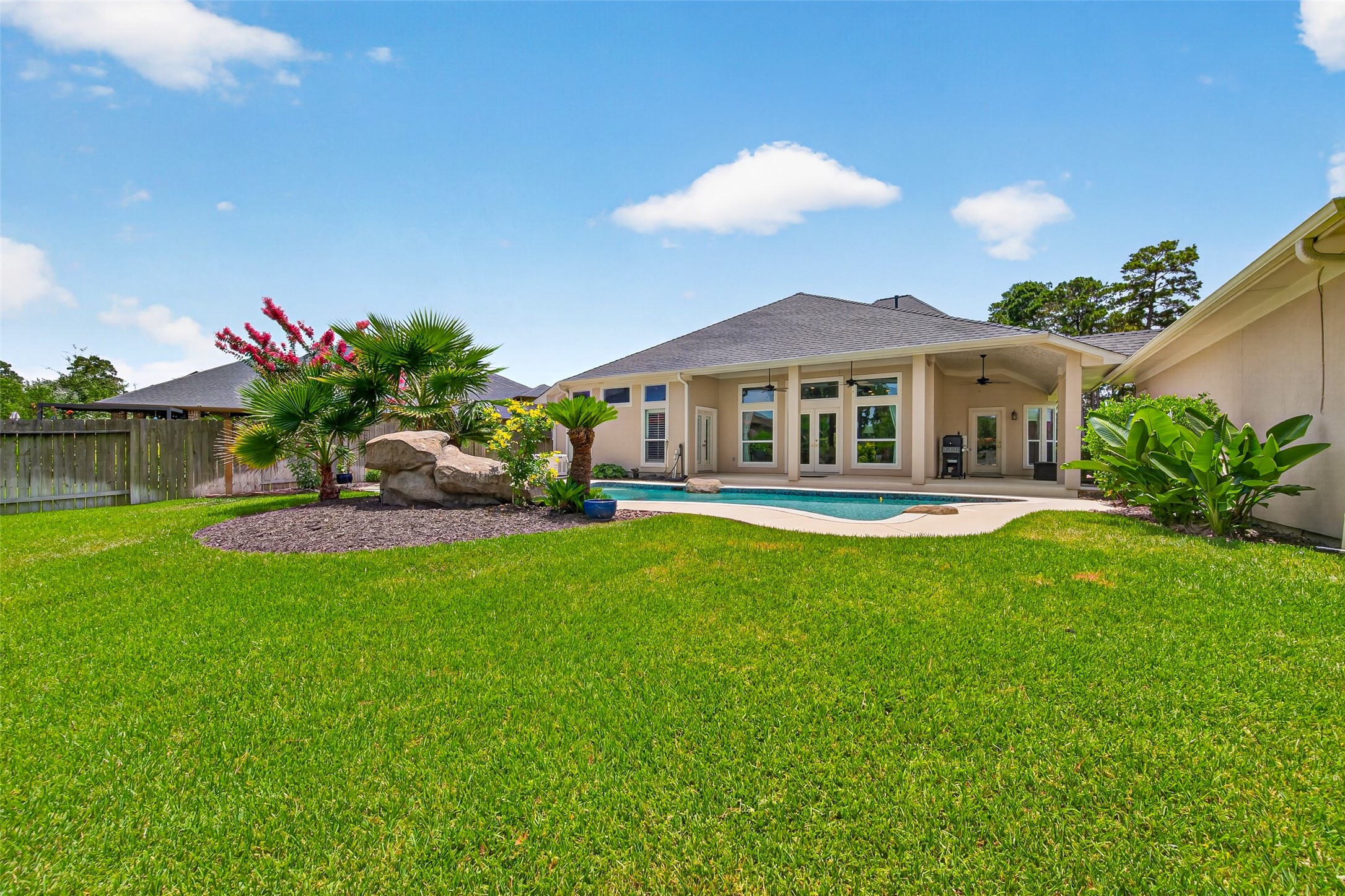8114 Hideaway Run Way Spring, TX 77389 - Photo 32 of 37 The backyard view takes center stage!