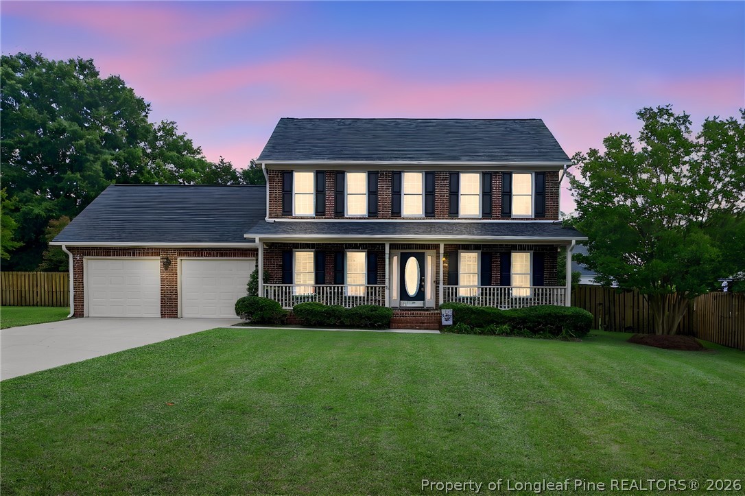 28 Coyt Circle Spring Lake, NC 28390 - Photo 1 of 41 a front view of a house with a yard and garage