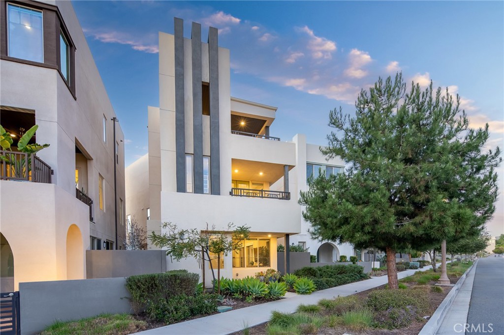 117 Bosque Irvine, CA 92618 - Photo 1 of 1 a front view of a house with a yard and outdoor seating