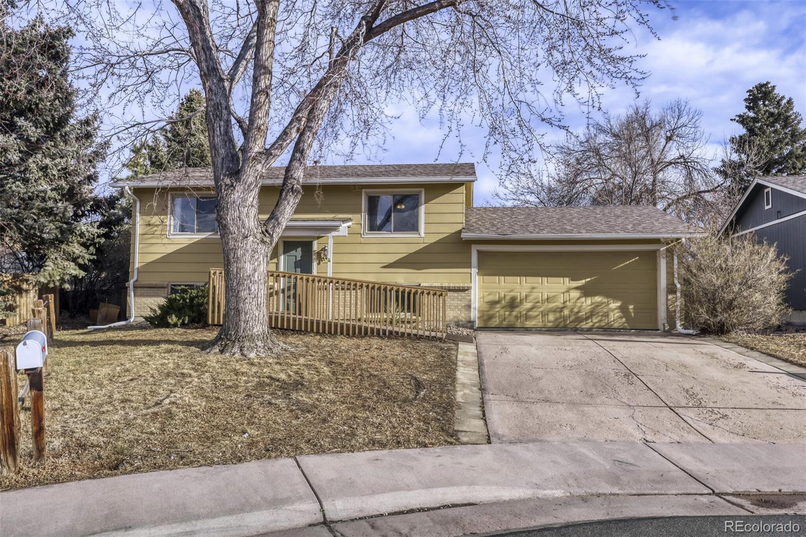 front view of a house with a trees