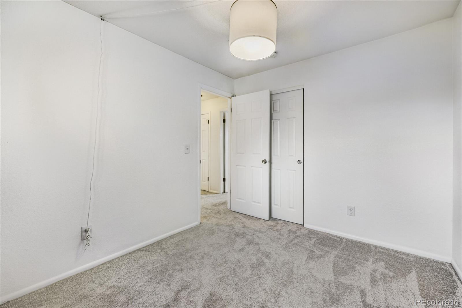 9168 Flower Court Westminster, CO 80021 - Photo 20 of 38 a view of an empty room