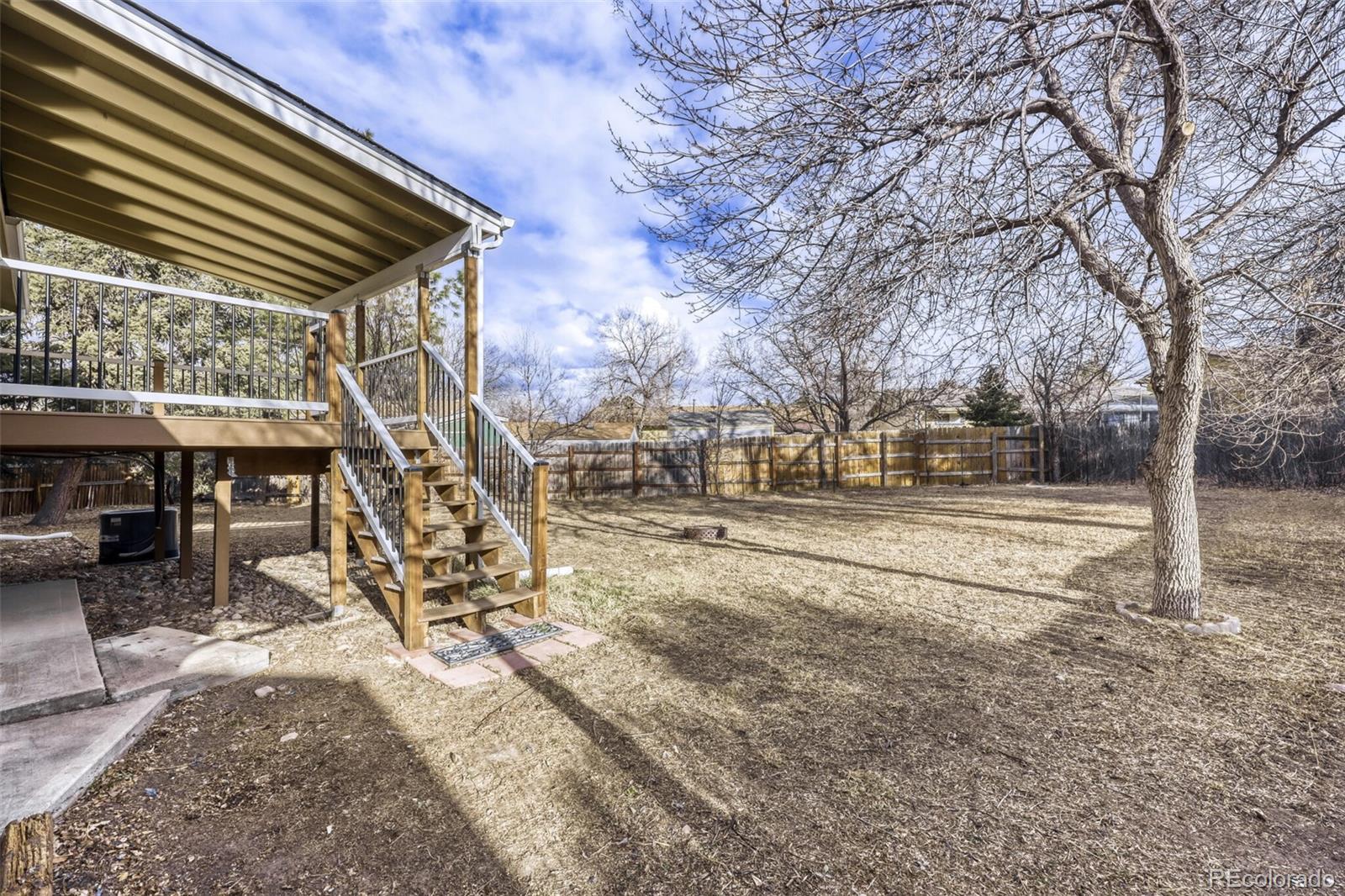 9168 Flower Court Westminster, CO 80021 - Photo 33 of 38 a view of outdoor space yard and patio
