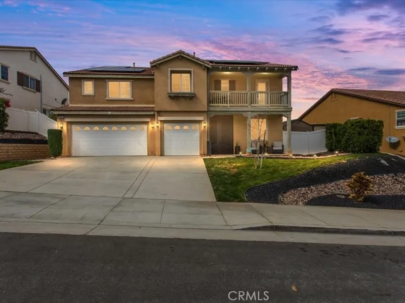 15851 Sulphur Springs Road Moreno Valley, CA 92555 - Photo 1 of 47 a front view of a house with a yard