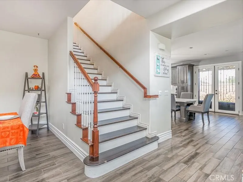 15851 Sulphur Springs Road Moreno Valley, CA 92555 - Photo 24 of 47 a view of entryway and hall with wooden floor