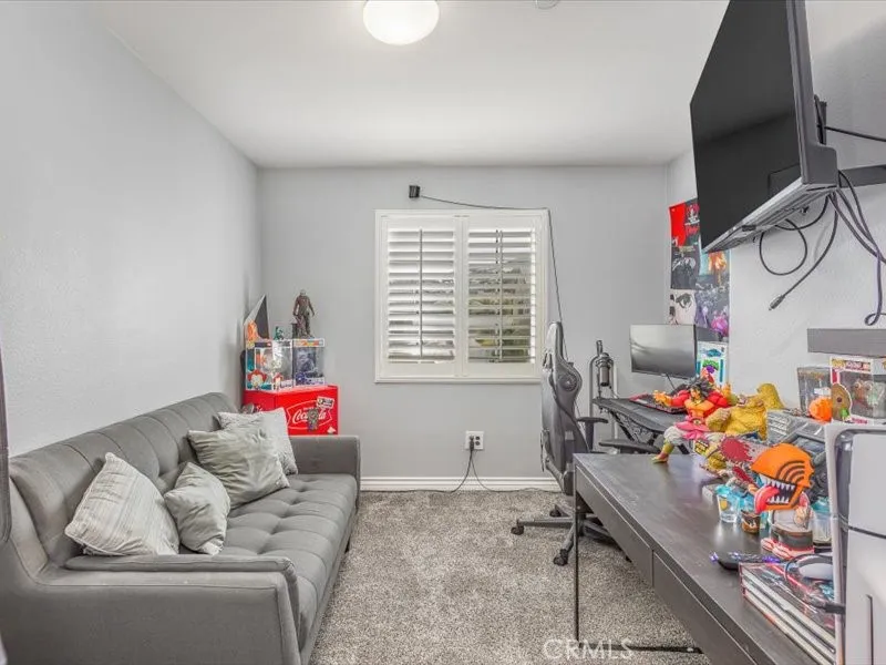 15851 Sulphur Springs Road Moreno Valley, CA 92555 - Photo 30 of 47 a room with toys and a window