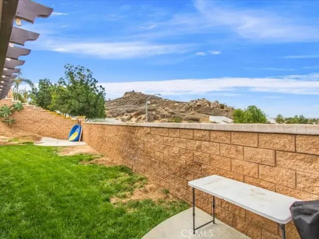 a view of a terrace with a lake view
