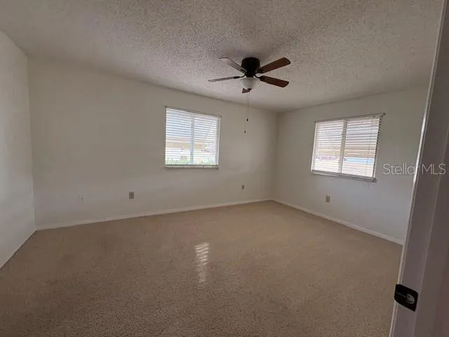 a view of a window in an empty room
