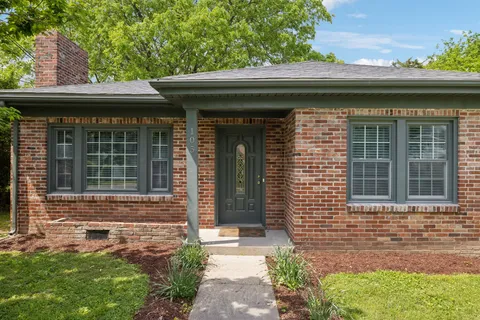a front view of a house with a porch