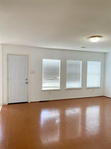 a kitchen with stainless steel appliances granite countertop a sink and a stove