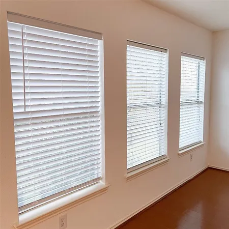 a view of a room that has a window in it