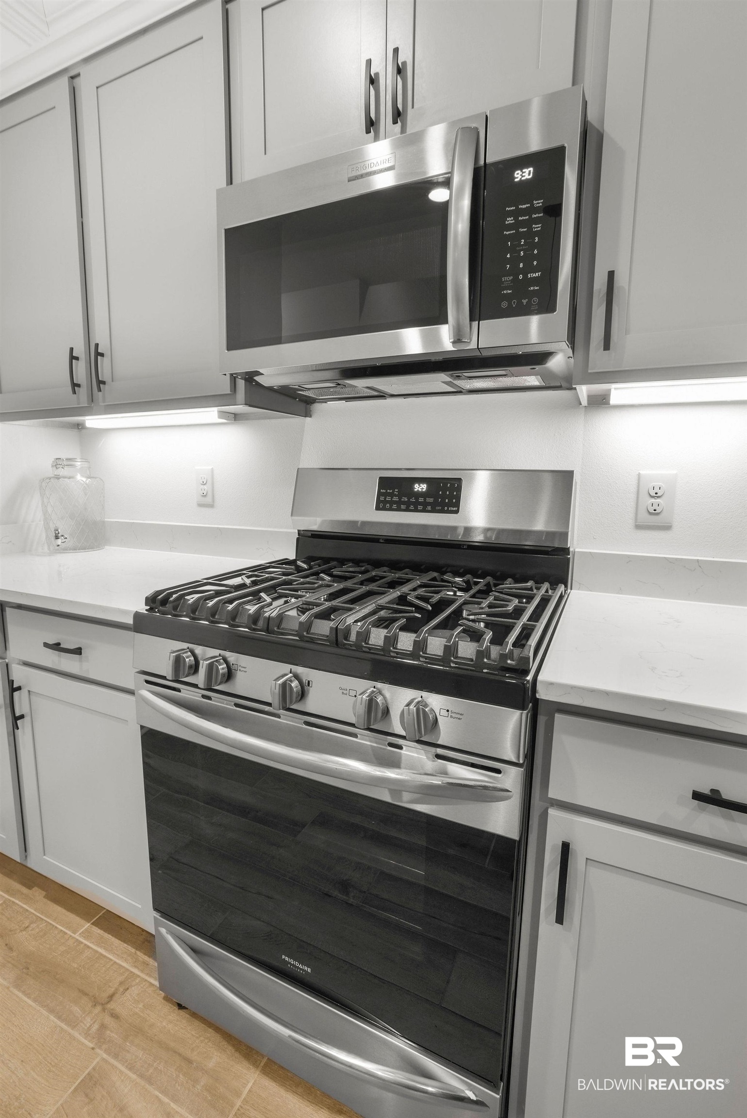 9855 Chipper Lane Foley, AL 36535 - Photo 12 of 48 Kitchen featuring light hardwood / wood-style floors and stainless steel appliances
