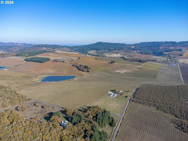 an aerial view of beach and ocean