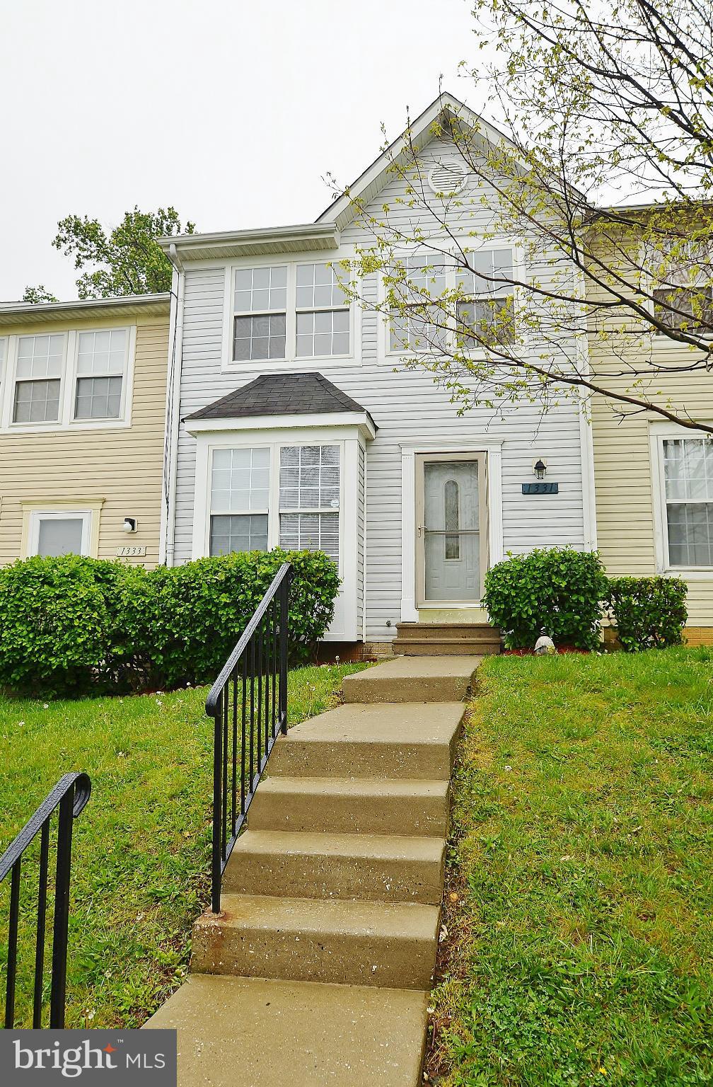 1331 Hazel Street Baltimore, MD 21226 - Photo 1 of 19 a front view of a house with a yard