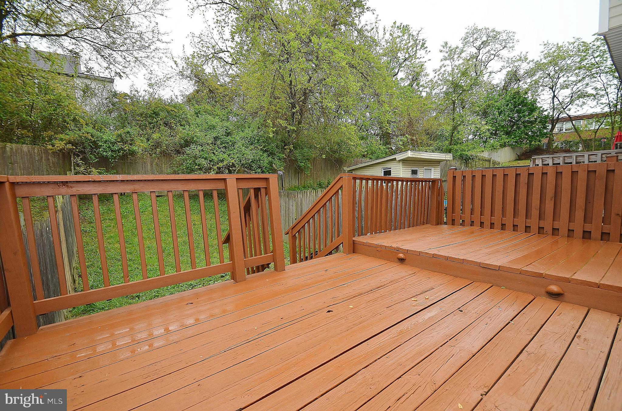 1331 Hazel Street Baltimore, MD 21226 - Photo 18 of 19 a balcony with wooden floor