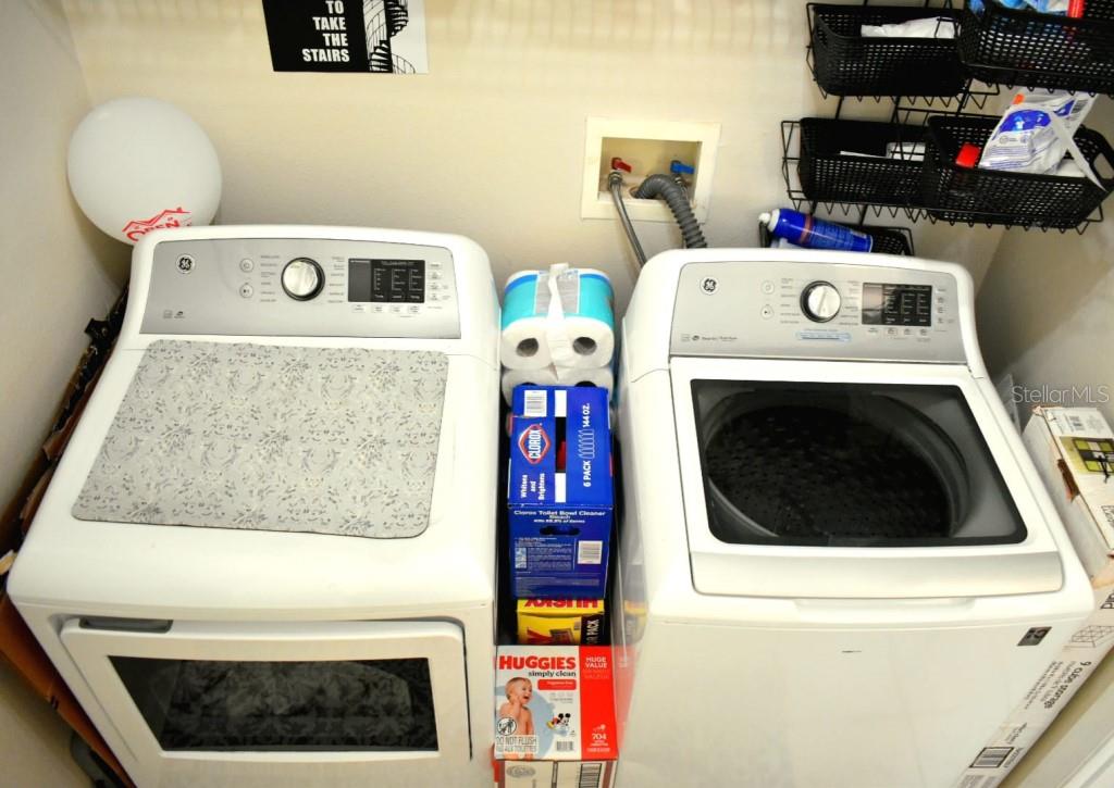 13541 Tetherline Trail Orlando, FL 32837 - Photo 28 of 39 a utility room with dryer and washer