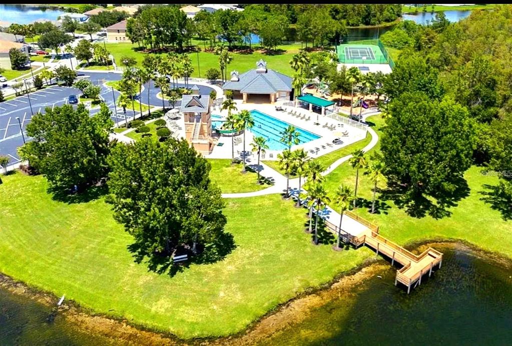 13541 Tetherline Trail Orlando, FL 32837 - Photo 39 of 39 a view of a swimming pool with a yard