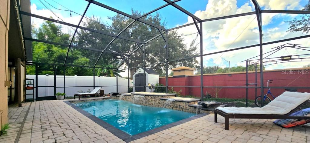 13541 Tetherline Trail Orlando, FL 32837 - Photo 5 of 39 a view of a backyard with couches chair and fire pit