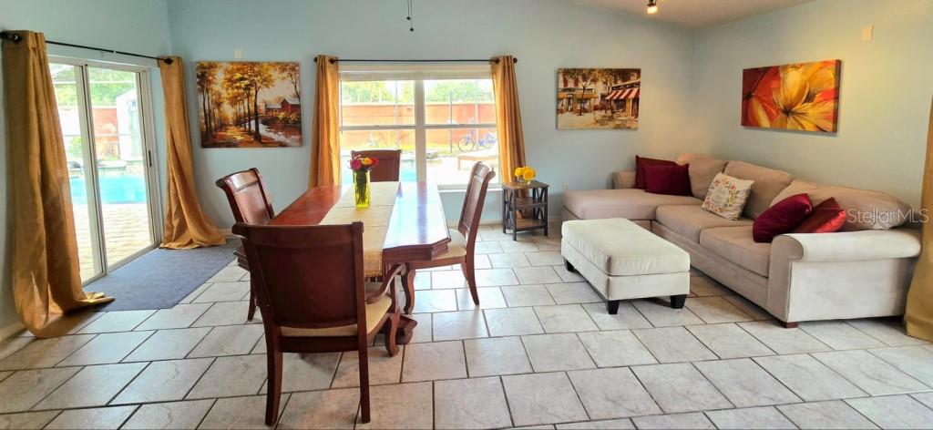 13541 Tetherline Trail Orlando, FL 32837 - Photo 10 of 39 a living room with furniture and a window