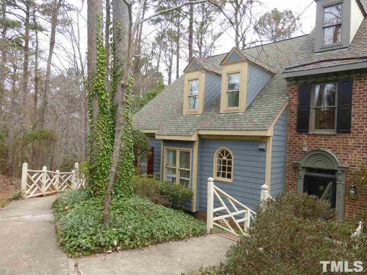 6846 Gloucester Road Raleigh, NC 27612 - Photo 1 of 18 a front view of a house with a yard