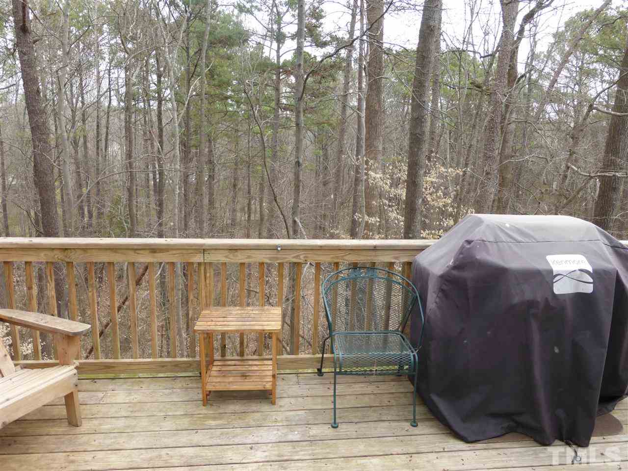 6846 Gloucester Road Raleigh, NC 27612 - Photo 17 of 18 a balcony with a bench