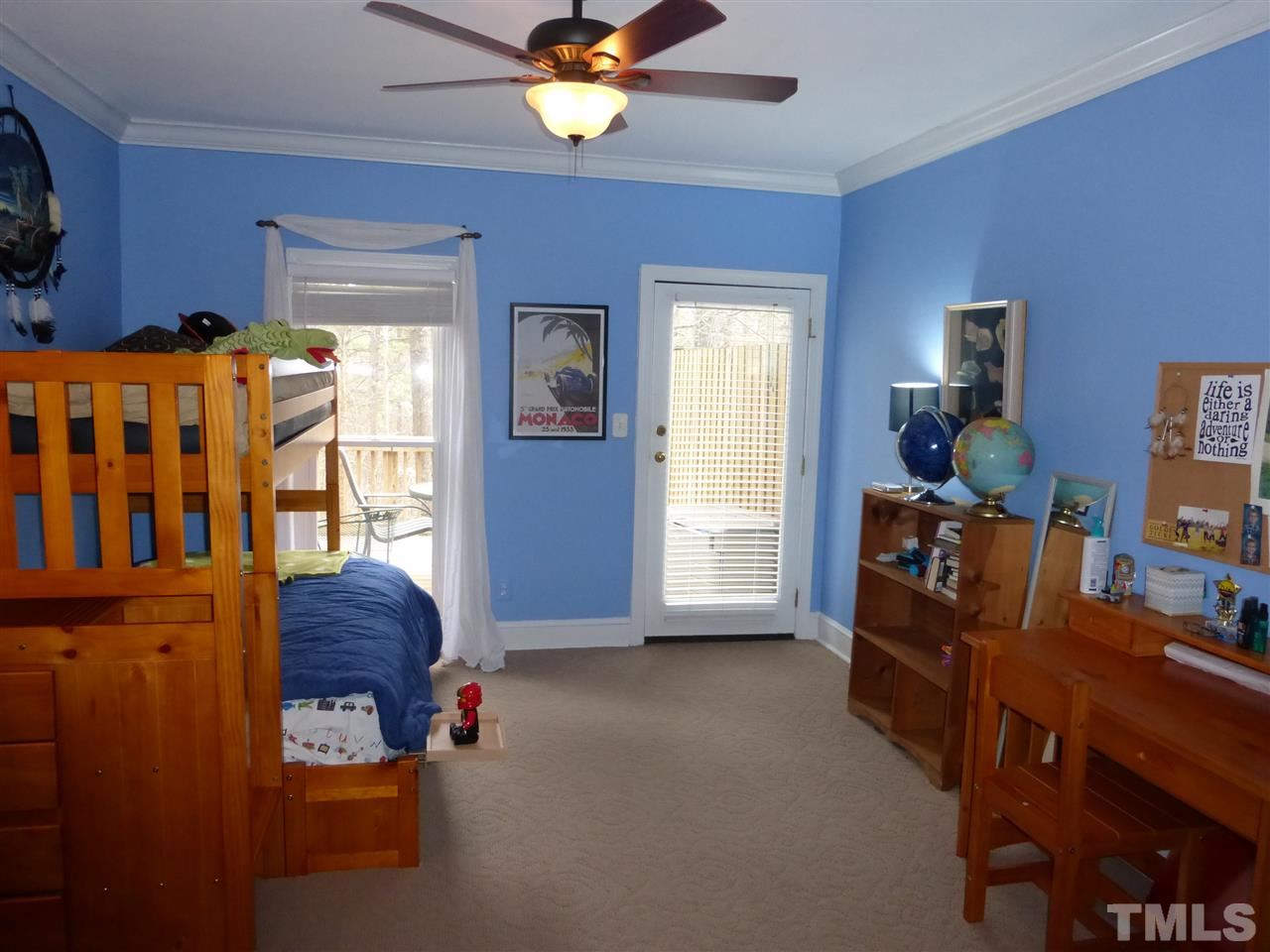 6846 Gloucester Road Raleigh, NC 27612 - Photo 10 of 18 a living room with furniture and wooden floor