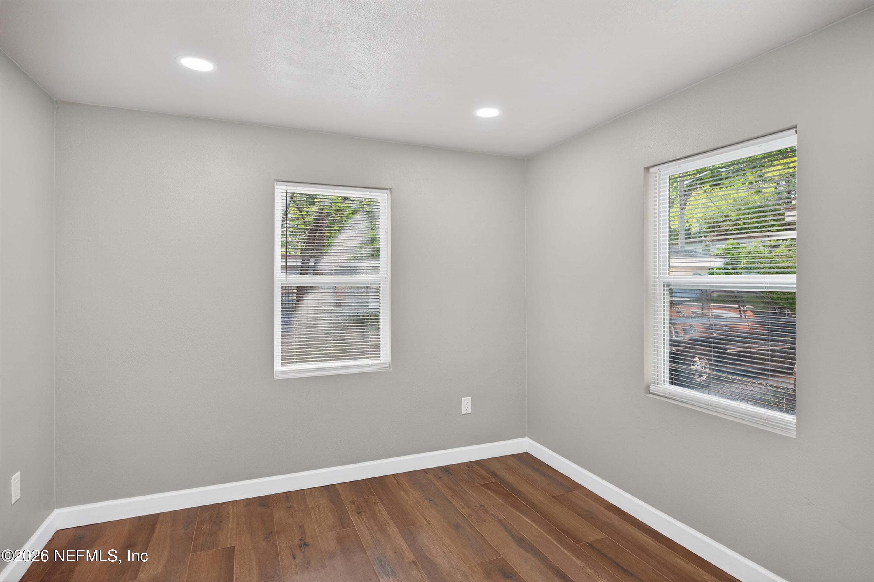 1741 Tyler Street Jacksonville, FL 32209 - Photo 20 of 25 an empty room with windows