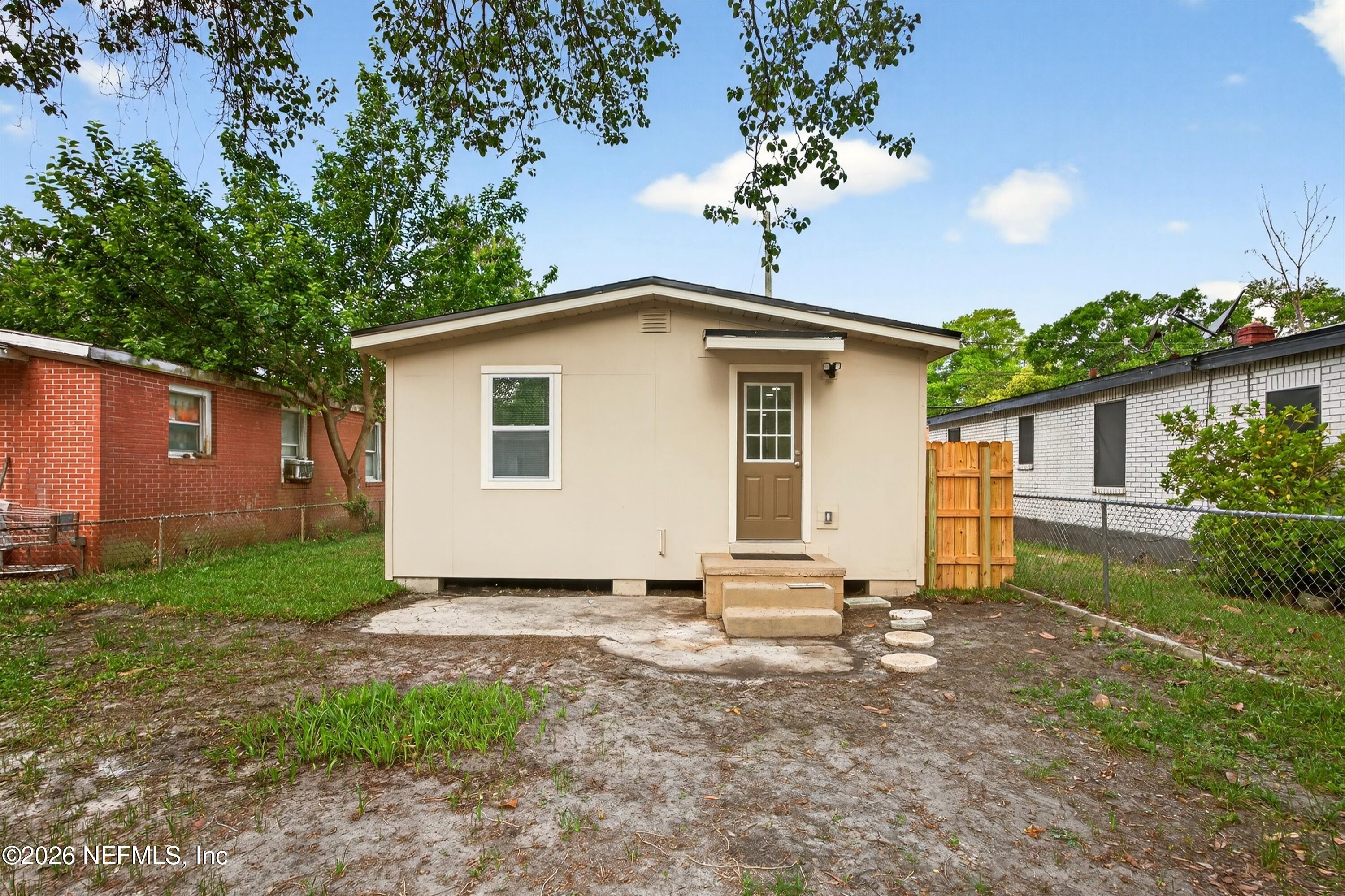 1741 Tyler Street Jacksonville, FL 32209 - Photo 24 of 25 a view of a house with yard and a garden