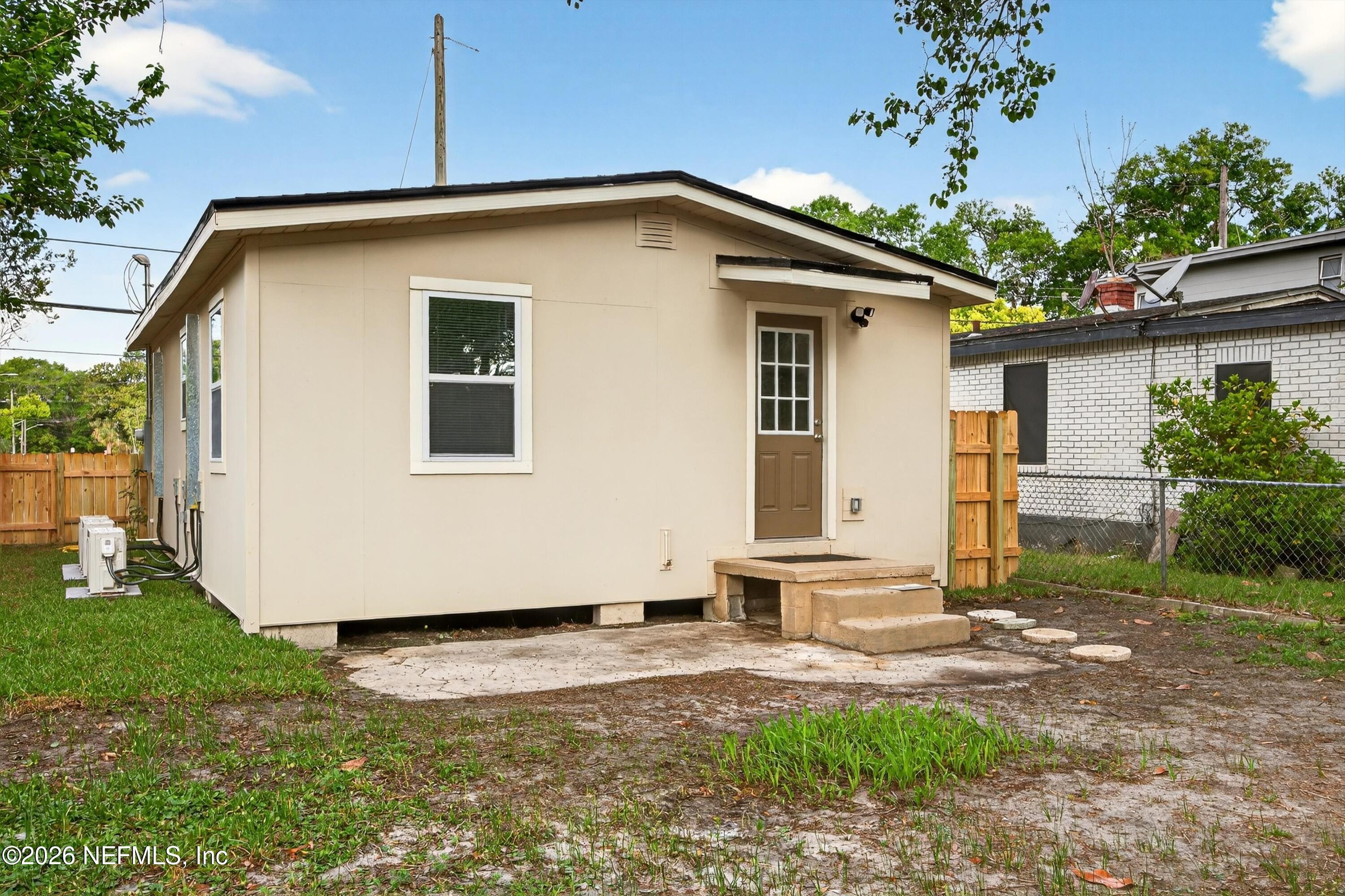 1741 Tyler Street Jacksonville, FL 32209 - Photo 25 of 25 a view of a house with a yard