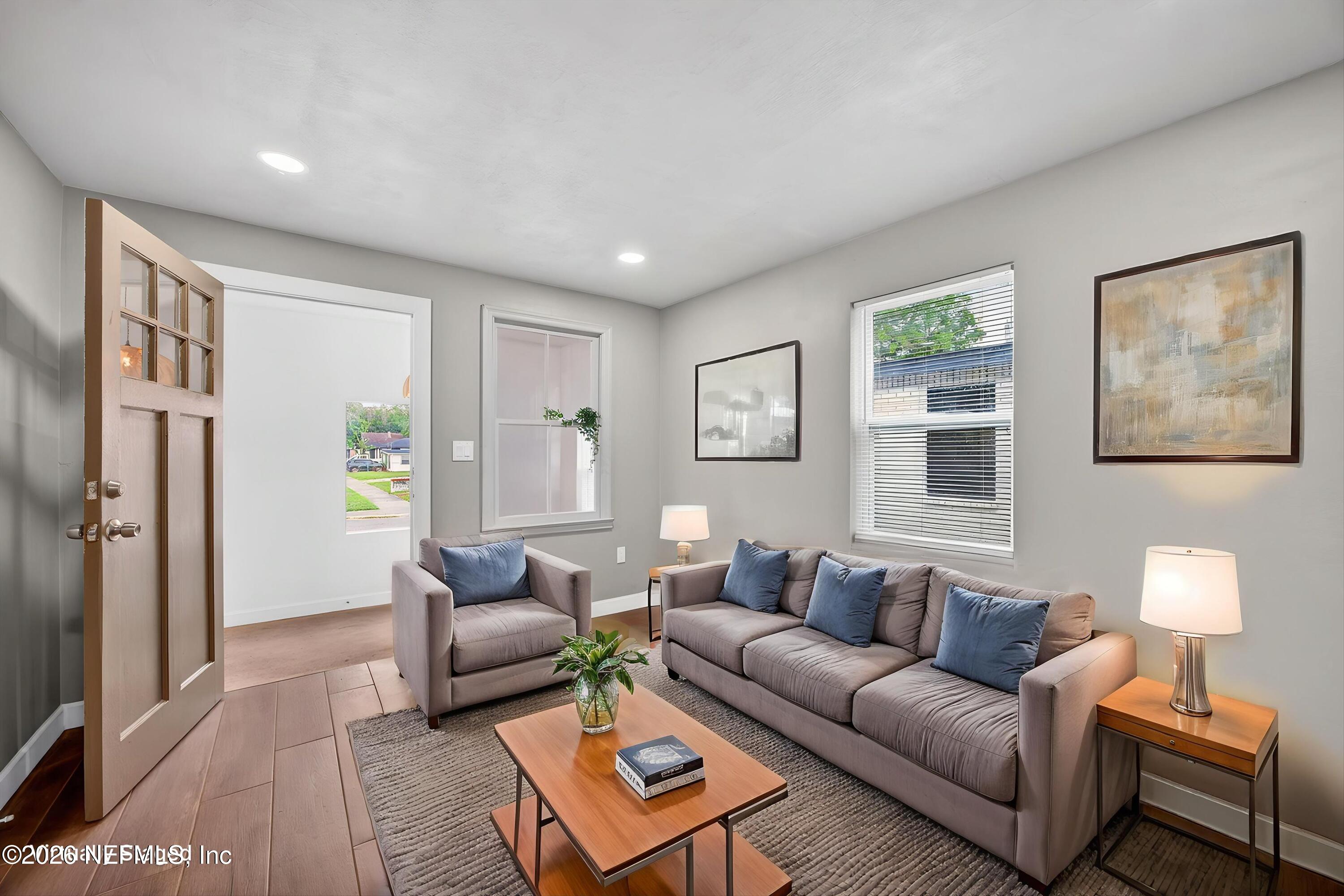 1741 Tyler Street Jacksonville, FL 32209 - Photo 4 of 25 a living room with furniture and a lamp