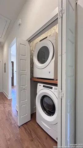 a utility room with dryer and washer