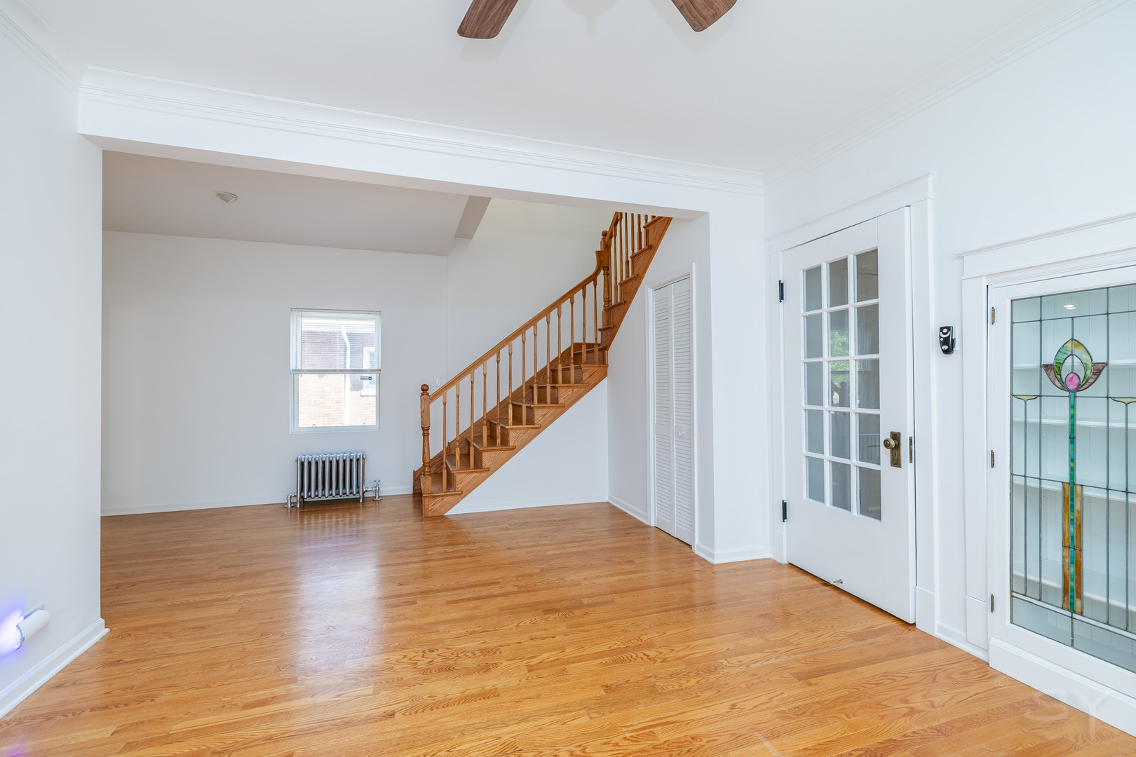 6752 Riverside Drive Berwyn, IL 60402 - Photo 8 of 33 a view of an entryway with wooden floor