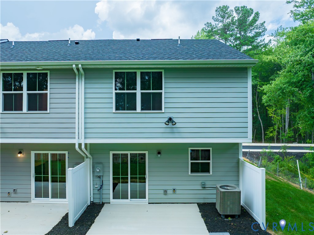 1121 Canterbury Ridge Road Richmond, VA 23224 - Photo 51 of 53 Exterior rear facade featuring light blue siding a