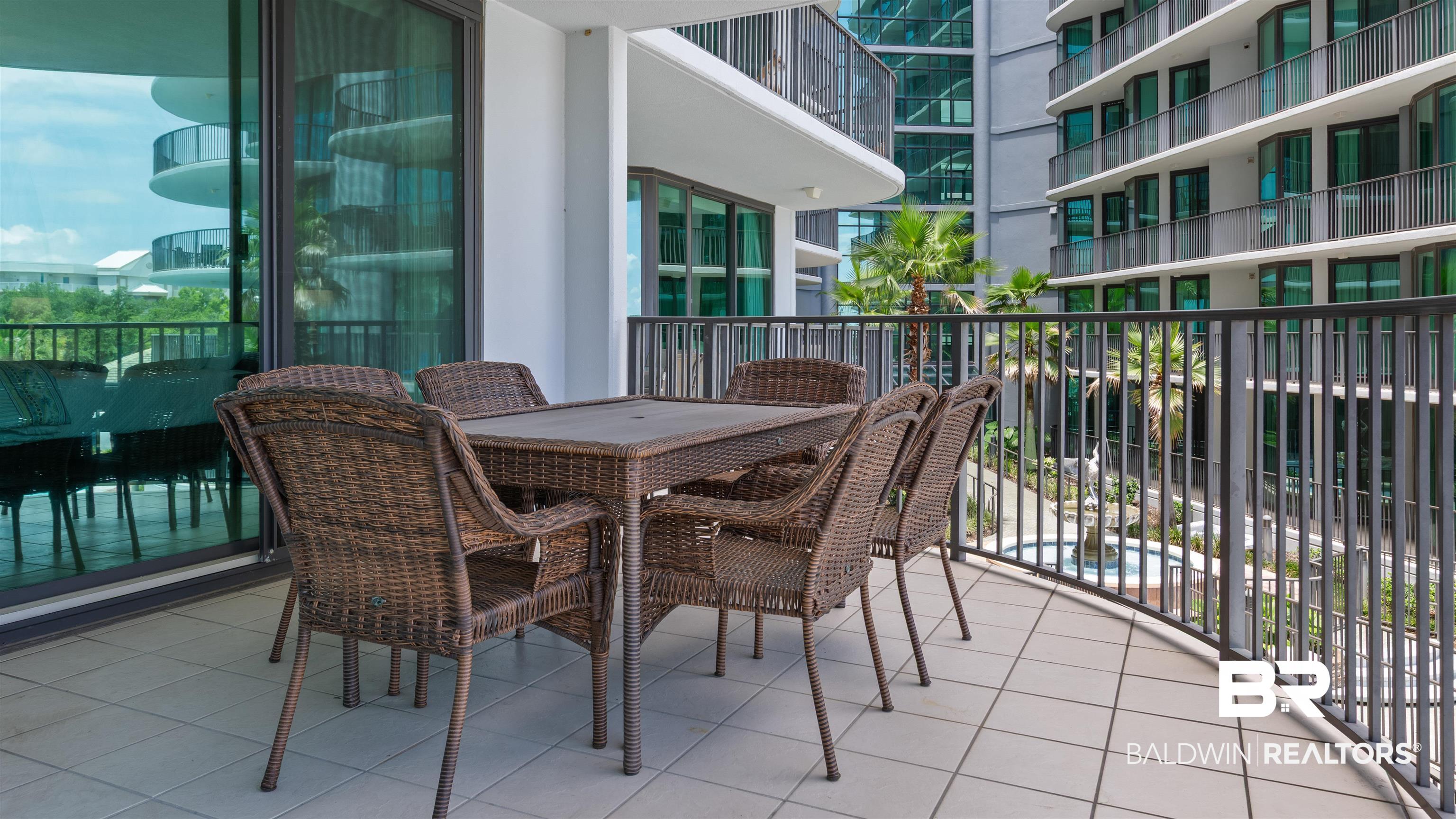 27582 Canal Road, Unit 2207 Orange Beach, AL 36561 - Photo 12 of 25 Balcony with outdoor dining space